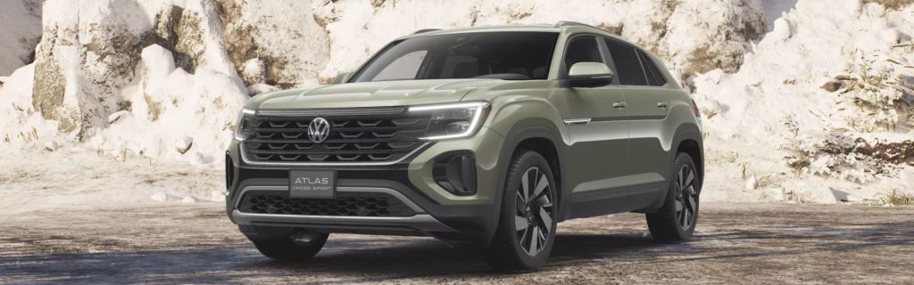 Volkswagen Atlas Cross Sport parked on a rocky, mountainous terrain