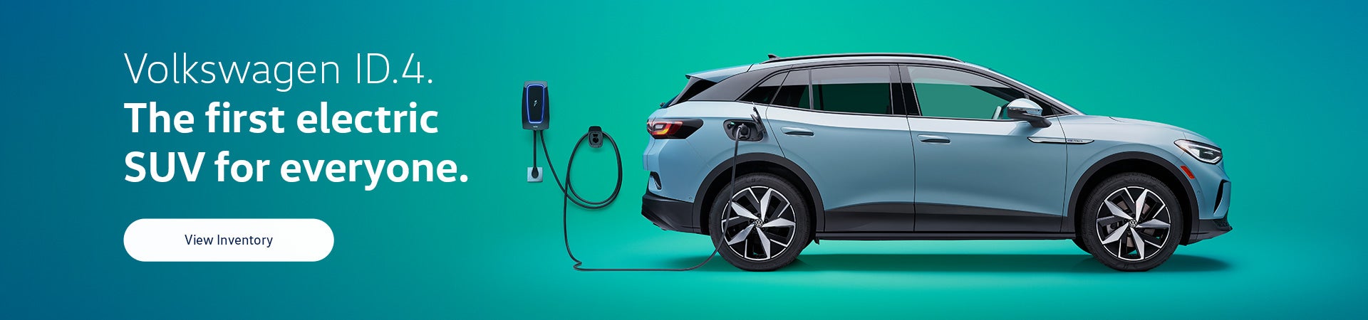 2023 ID.4 shown from the passenger side while connected to a charging station.